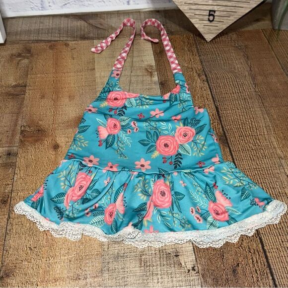 Oopsie daisy two
Piece swimsuit ruffle size 4 - Picture 5 of 10